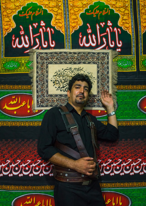 Iranian Shiite Alam Porter During Chehel Menbari Festival On Tasua Day To Commemorate The Martyrdom Of Imam Hussein, Lorestan Province, Khorramabad, Iran