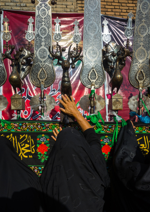 Iranian Shiite Women Putting Green Ribbons On An Alam To Make Wishes During Chehel Menbari Festival On Tasua Day, Lorestan Province, Khorramabad, Iran