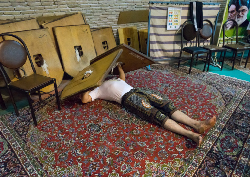 Iranian Man Training With Sangs In Saheb A Zaman Club Zurkhaneh, Yazd Province, Yazd, Iran