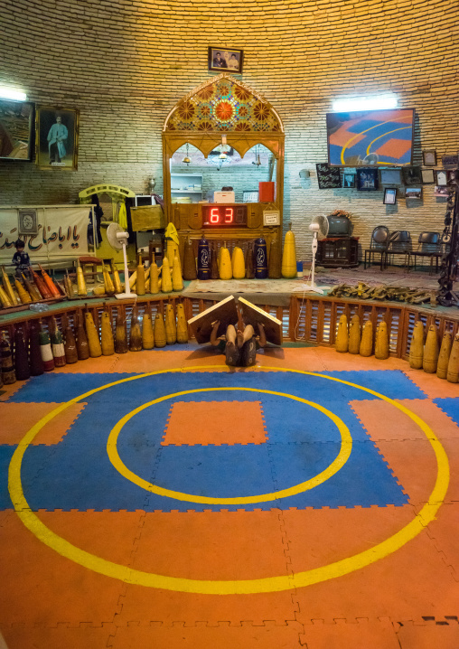 Iranian Man Training With Sangs In Saheb A Zaman Club Zurkhaneh, Yazd Province, Yazd, Iran
