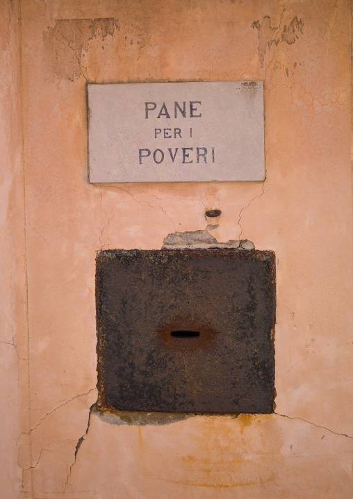 Bread for the poor church charity box, Veneto Region, Venice, Italy