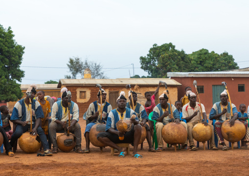 African musicians playing koras during Boloye dance of the panther man, Savanes district, Waraniene, Ivory Coast
