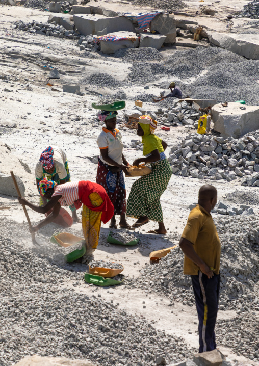 African people working in a granite quarry, Savanes district, Shienlow, Ivory Coast