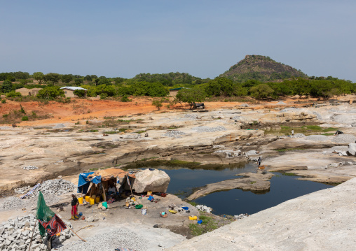 African people working in a granite quarry, Savanes district, Shienlow, Ivory Coast