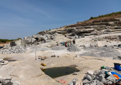 African people working in a granite quarry, Savanes district, Shienlow, Ivory Coast
