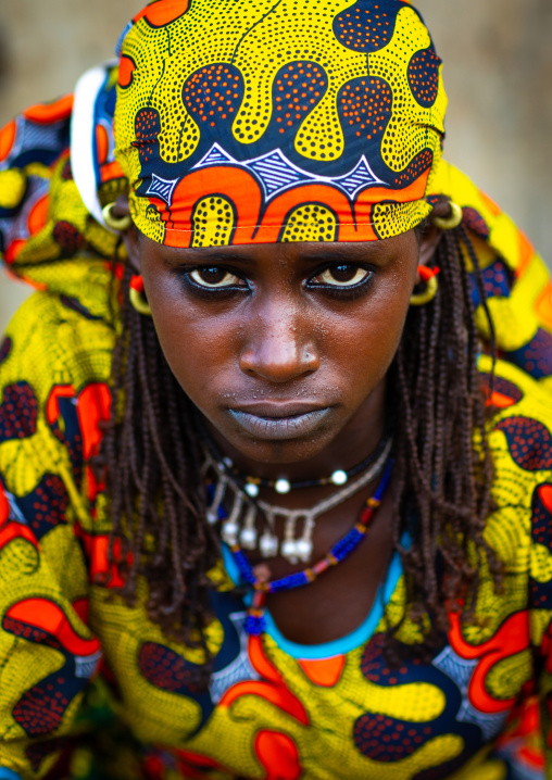 Portrait of a Peul tribe young woman with colorful clothes, Savanes district, Boundiali, Ivory Coast