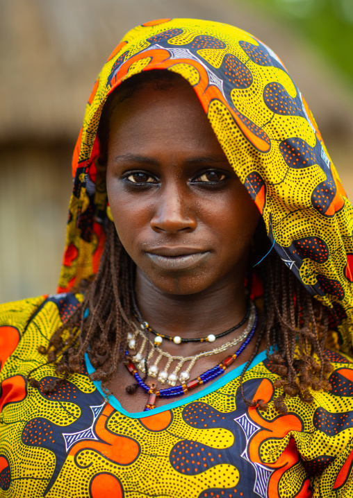 Portrait of a Peul tribe young woman with colorful clothes, Savanes district, Boundiali, Ivory Coast