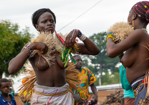Young Senufo shirtless women dancing the Ngoro during a ceremony, Savanes district, Ndara, Ivory Coast