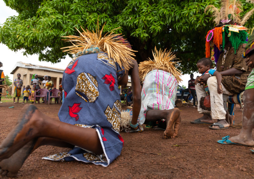 Young Senufo shirtless women dancing the Ngoro during a ceremony, Savanes district, Ndara, Ivory Coast