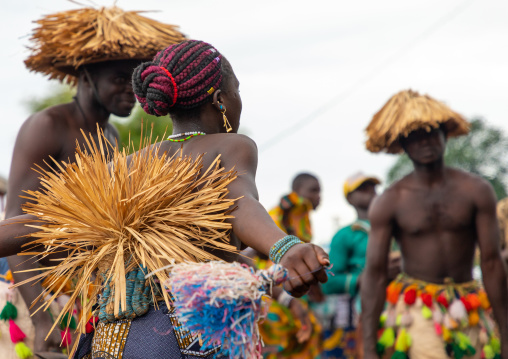 Senufo shirtless man dancing the Ngoro during a ceremony, Savanes district, Ndara, Ivory Coast