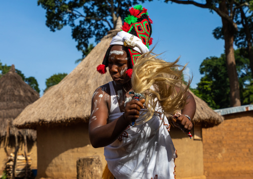 Dan tribe woman with a headdress dancing during a ceremony, Bafing, Gboni, Ivory Coast