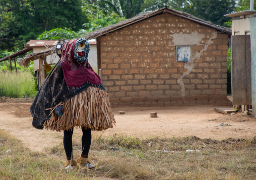 We Guere sacred mask coming out of the sacred forest for a ceremony, Guémon, Bangolo, Ivory Coast