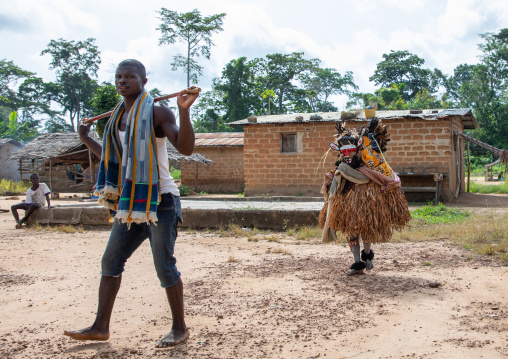 We Guere sacred mask coming out of the sacred forest for a ceremony, Guémon, Bangolo, Ivory Coast