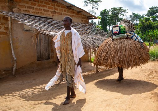 We Guere sacred mask coming out of the sacred forest for a ceremony, Guémon, Bangolo, Ivory Coast