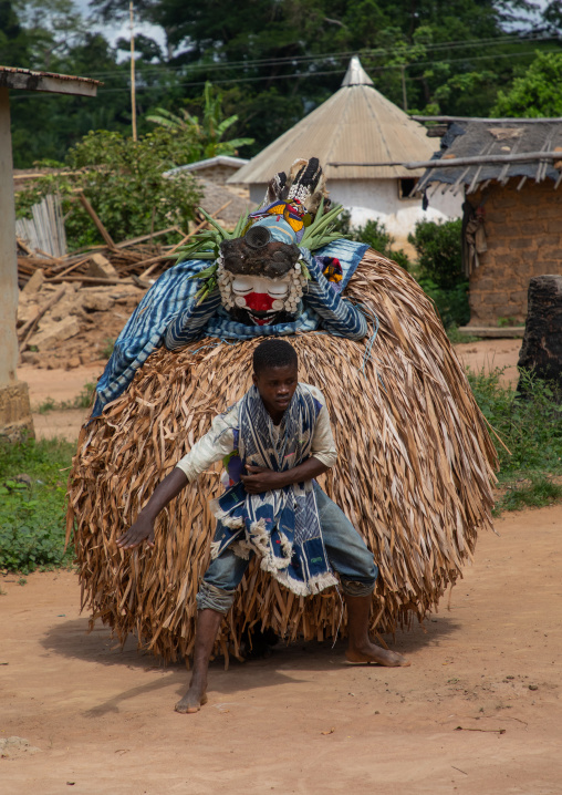 We Guere sacred mask dance during a ceremony, Guémon, Bangolo, Ivory Coast