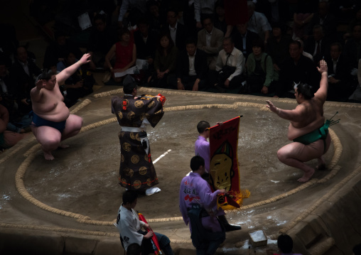 Sumo wrestlers before the fight in the ryogoku kokugikan sumo arena, Kanto region, Tokyo, Japan