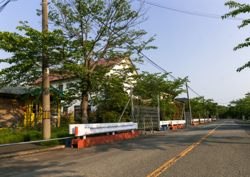 Roadblock in the difficult-to-return zone after the daiichi nuclear power plant irradiation, Fukushima prefecture, Tomioka, Japan