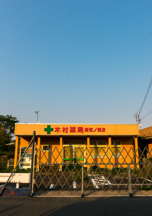 Abandoned pharmacy in the difficult-to-return zone after the daiichi nuclear power plant irradiation, Fukushima prefecture, Tomioka, Japan