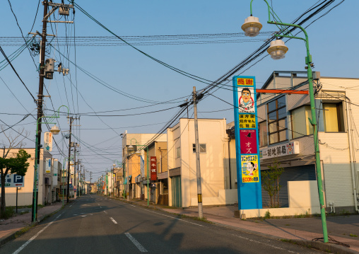 Deserted street in the difficult-to-return zone after the daiichi nuclear power plant irradiation, Fukushima prefecture, Tomioka, Japan