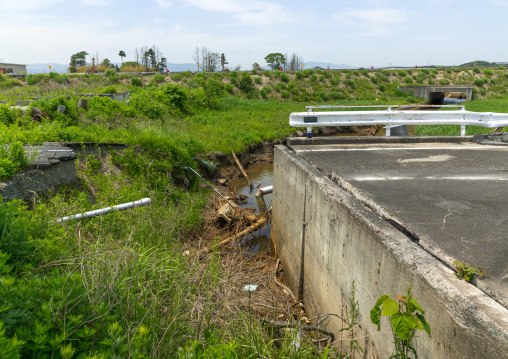 A collapsed road by the 2011 earthquake and tsunami, Fukushima prefecture, Futaba, Japan