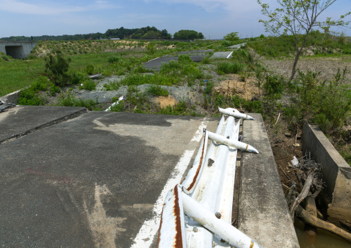 A collapsed road by the 2011 earthquake and tsunami, Fukushima prefecture, Futaba, Japan