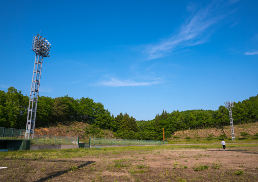 Baseball field in the highly contaminated area after the daiichi nuclear power plant explosion, Fukushima prefecture, Iitate, Japan