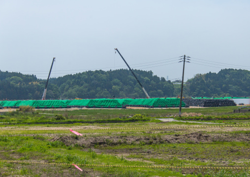 Bags containing irradiated debris are stacked in an area that was affected by the 2011 tsunami and nuclear disaster, Fukushima prefecture, Namie, Japan