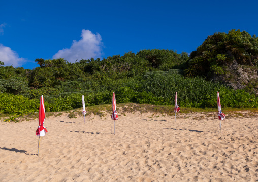 Beach umbrella in sunset beach, Yaeyama Islands, Ishigaki, Japan