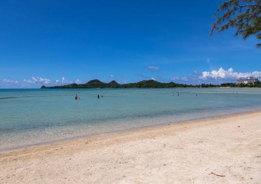 People having a bath in Sukuji beach inside anti-jellyfish net, Yaeyama Islands, Ishigaki, Japan