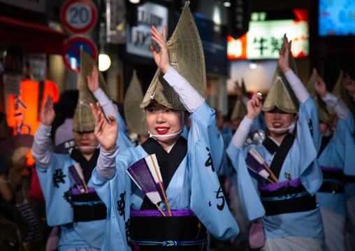 Japanese women with straw hats during the Koenji Awaodori dance summer street festival, Kanto region, Tokyo, Japan