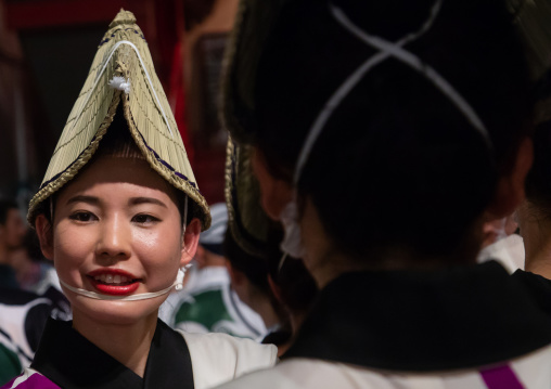 Japanese woman with straw hat during the Koenji Awaodori dance summer street festival, Kanto region, Tokyo, Japan