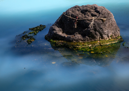 Pond with turquoise color in Kamado jigoku cooking pot hell, Oita Prefecture, Beppu, Japan
