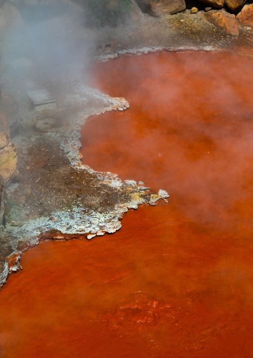 Orange thermal mud hell in Kamado jigoku cooking pot hell, Oita Prefecture, Beppu, Japan