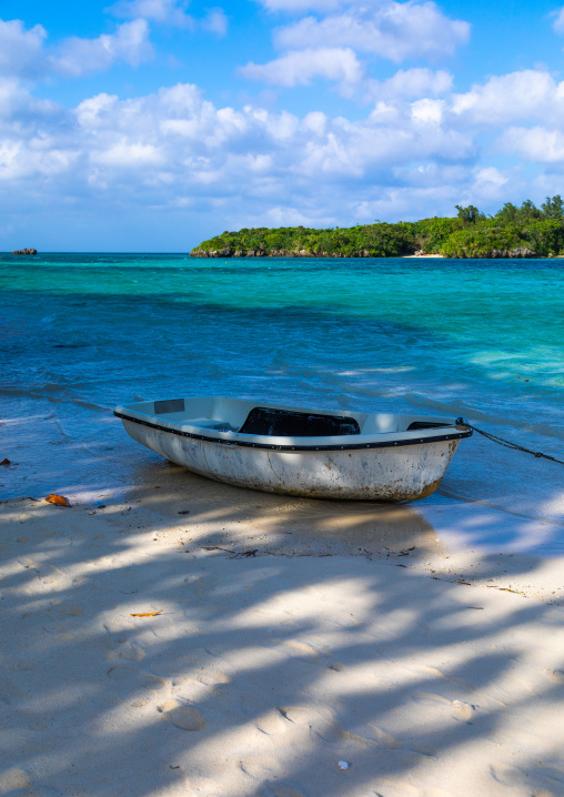 Fishing boat on the sand in Kabira bay, Yaeyama Islands, Ishigaki-jima, Japan