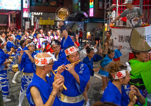 Japanese musicians during the Koenji Awaodori dance summer street festival, Kanto region, Tokyo, Japan