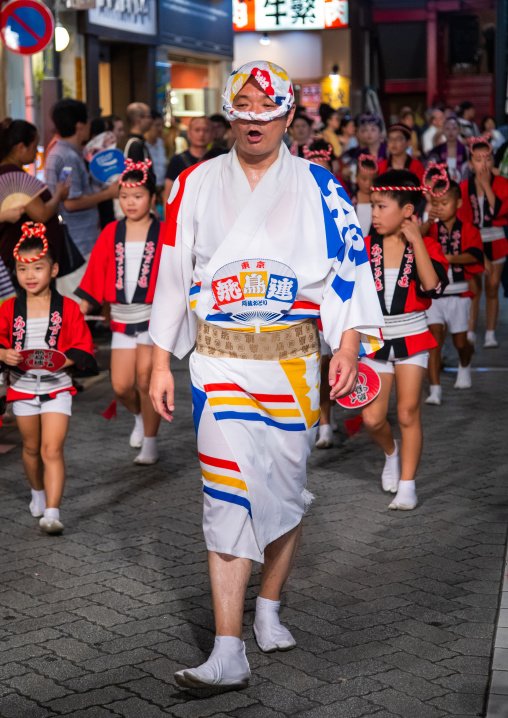 Japanese dancers during the Koenji Awaodori dance summer street festival, Kanto region, Tokyo, Japan