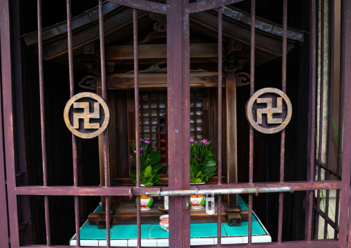 Shrine with swastika crosses, Kansai region, Kyoto, Japan