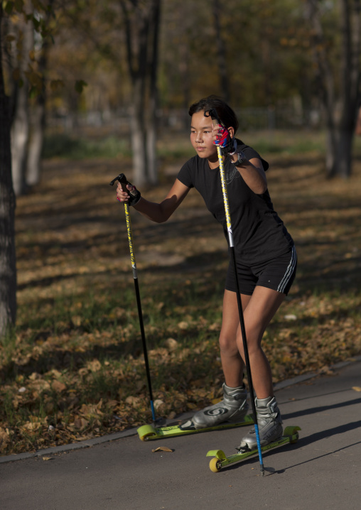 Girl Roller Skiing In Astana Park, Kazakhstan