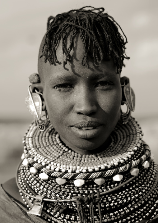 Turkana tribe woman with huge necklaces and earrings, Turkana lake, Loiyangalani, Kenya