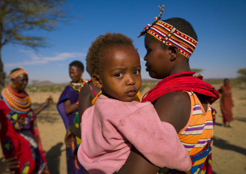 Samburu mother holding her baby, Samburu county, Samburu national reserve, Kenya