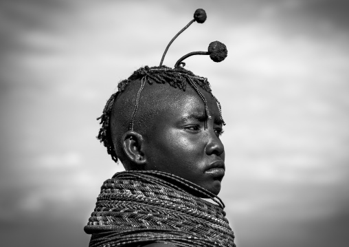Turkana tribe woman with huge necklaces and ear rings, Turkana lake, Loiyangalani, Kenya