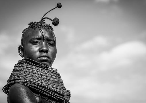 Turkana tribe woman with huge necklaces and ear rings, Turkana lake, Loiyangalani, Kenya