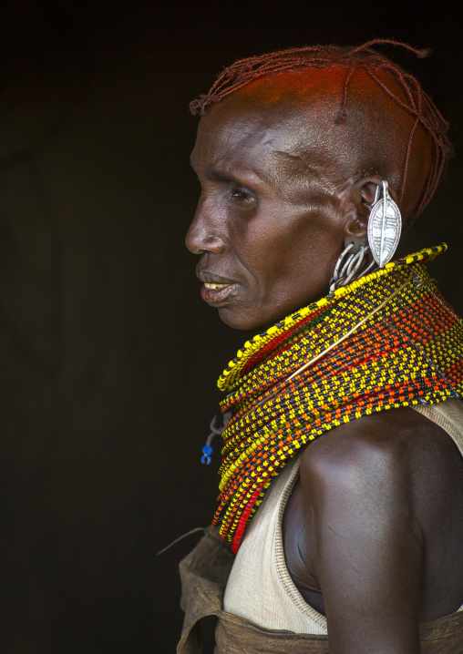 Turkana tribe woman with huge necklaces and earrings, Turkana lake, Loiyangalani, Kenya