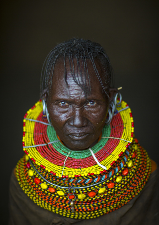 Turkana tribe woman with huge necklaces and earrings, Turkana lake, Loiyangalani, Kenya