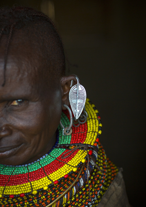 Turkana tribe woman with huge necklaces and earrings, Turkana lake, Loiyangalani, Kenya