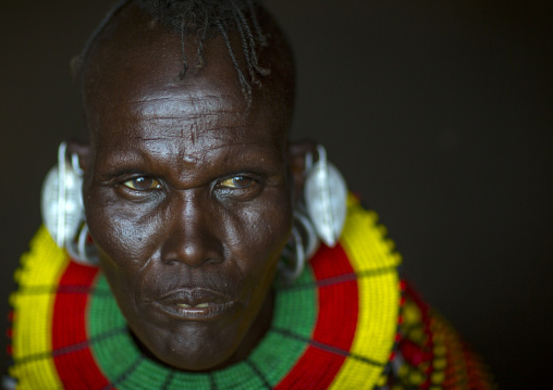 Turkana tribe woman with huge necklaces and earrings, Turkana lake, Loiyangalani, Kenya