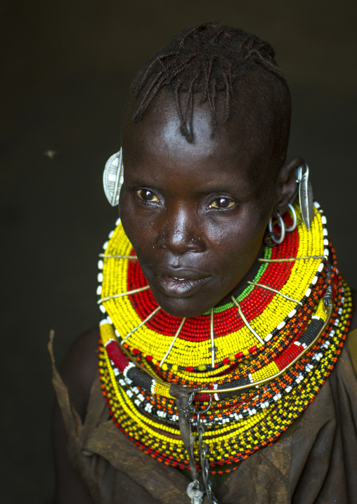 Turkana tribe woman with huge necklaces and earrings, Turkana lake, Loiyangalani, Kenya
