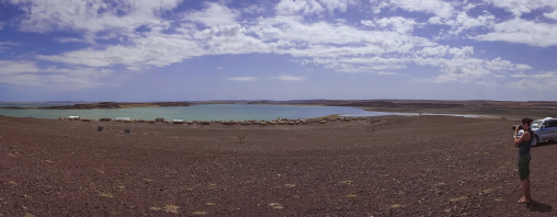 Tourist taking a picture, Turkana lake, Loiyangalani, Kenya