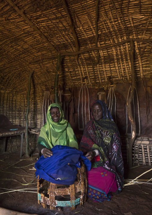 Borana tribe women inside a hut, Chalbi desert, Marsabit, Kenya