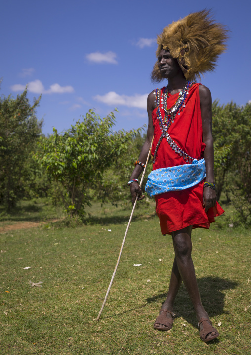 Maasai warrior with a lion hat fur on the head, Nakuru county, Nakuru, Kenya